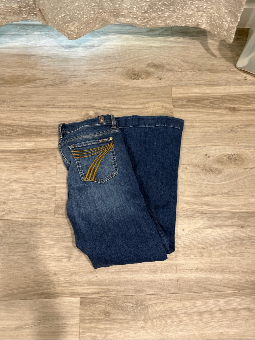 7 For All Mankind Dark Blue Bootcut Jeans with Yellow Pocket Stitching